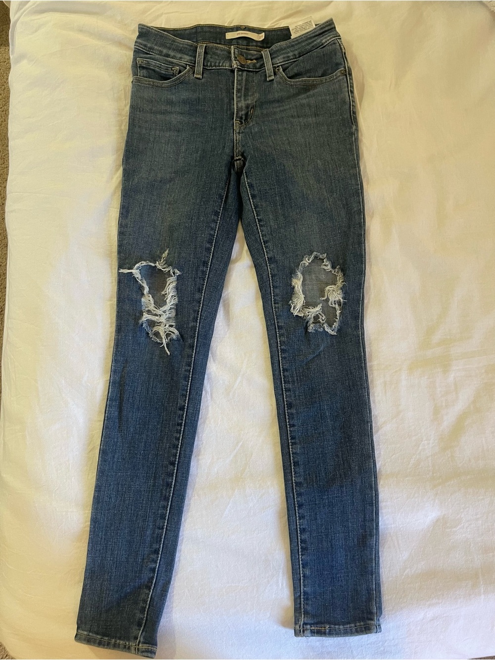 Levi’s 711 knee ripped skinny denim jeans pants